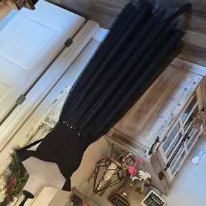 JJ's house.  Beautiful new black gown with sequins.  Great for weddings
